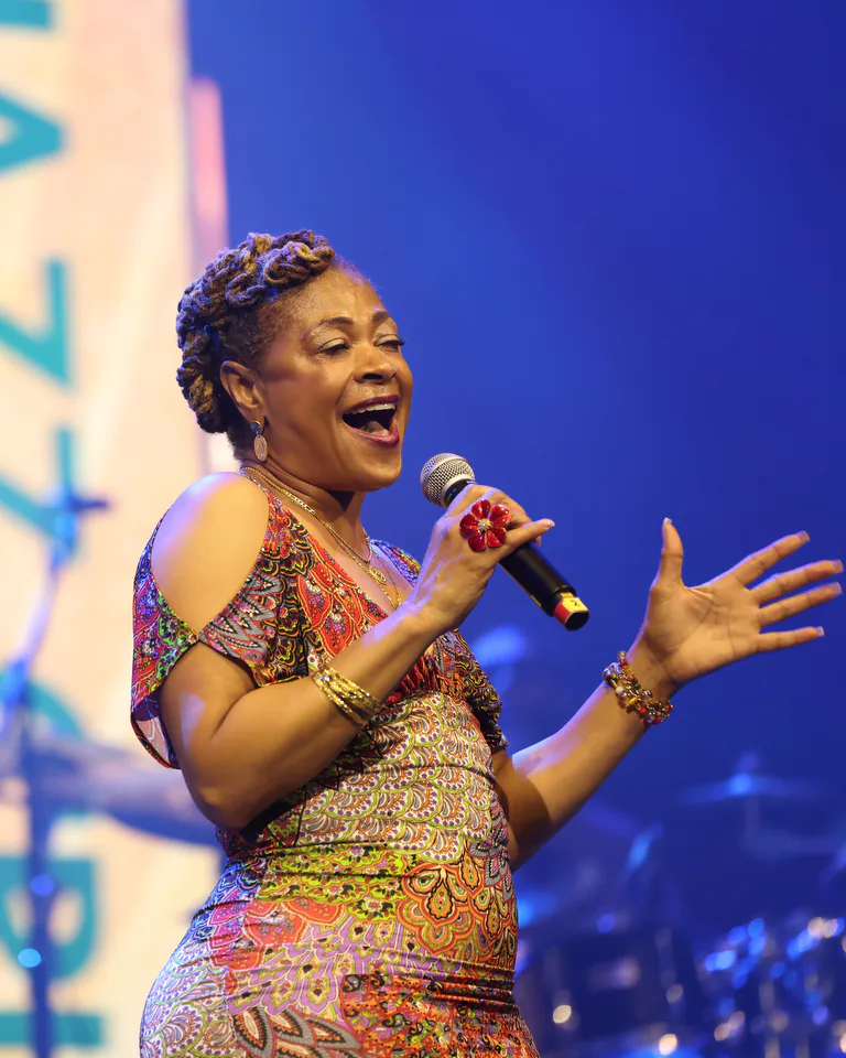 Bajan Moore singing on stage at The Smooth Jazz Cruise